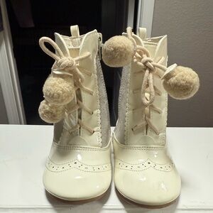 Cream Lace-Up Boots with Pom Poms